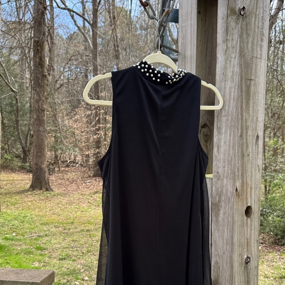 Classic Black Sleeveless Mini Dress with Pearl-Trim Neckline - Picture 5 of 9